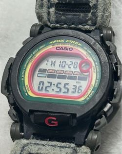 vintage Casio G-Shock DW-002BM-9 NEXAX Bob Marley Edition wristwatch, released around 1995 as part of the Rasta/Reggae-inspired series.