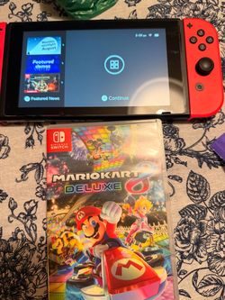 Nintendo Switch + Mario Kart 8 Deluxe – Works Great” and try $110.