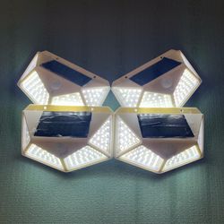 4 Pieces.. 100 Led Solar Motion Lights