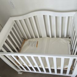 Mini crib and Mattress 