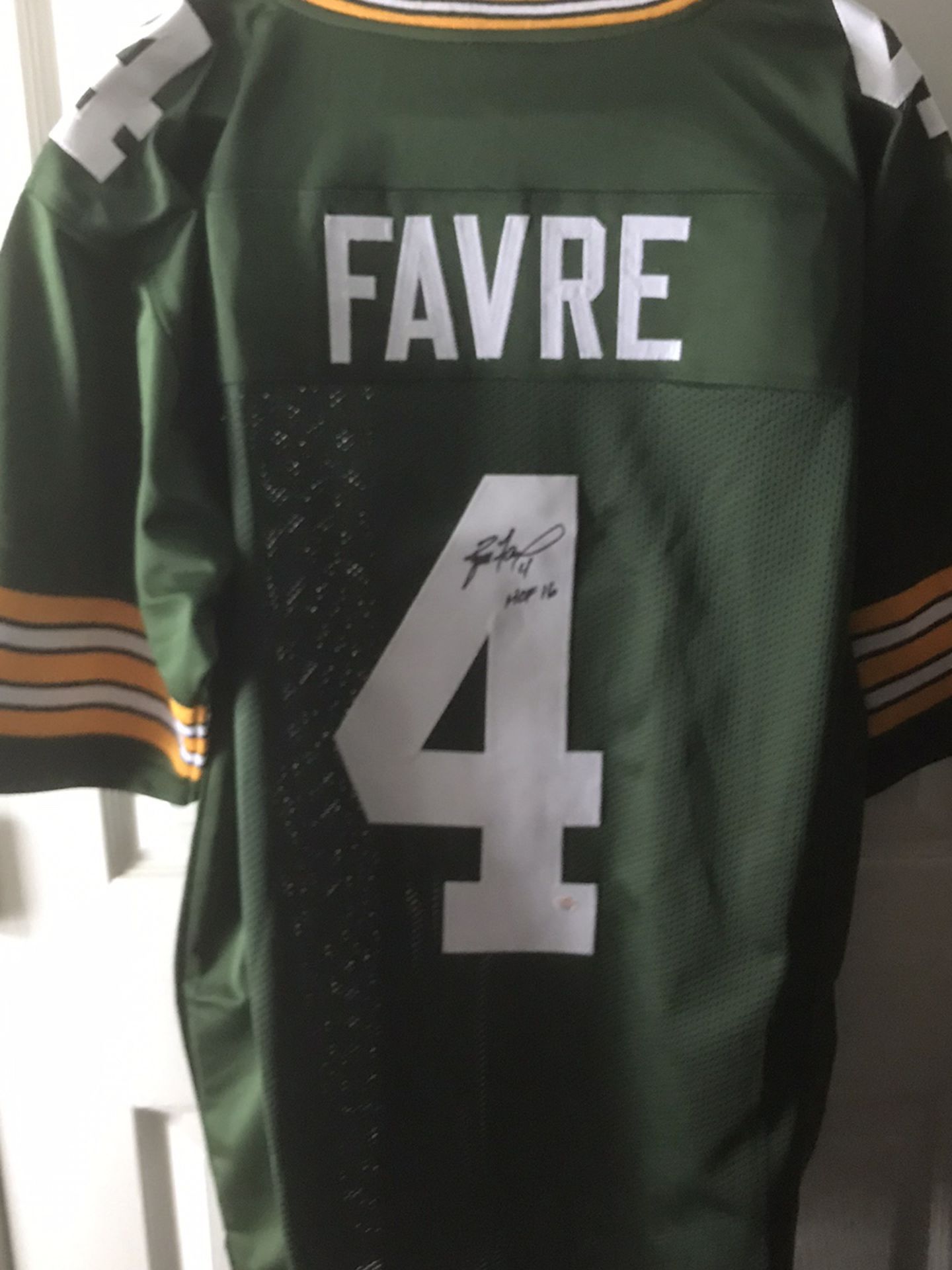 Brett Farve #4 HOF “16” autographed Greenbay Packers Jersey Comes With COA