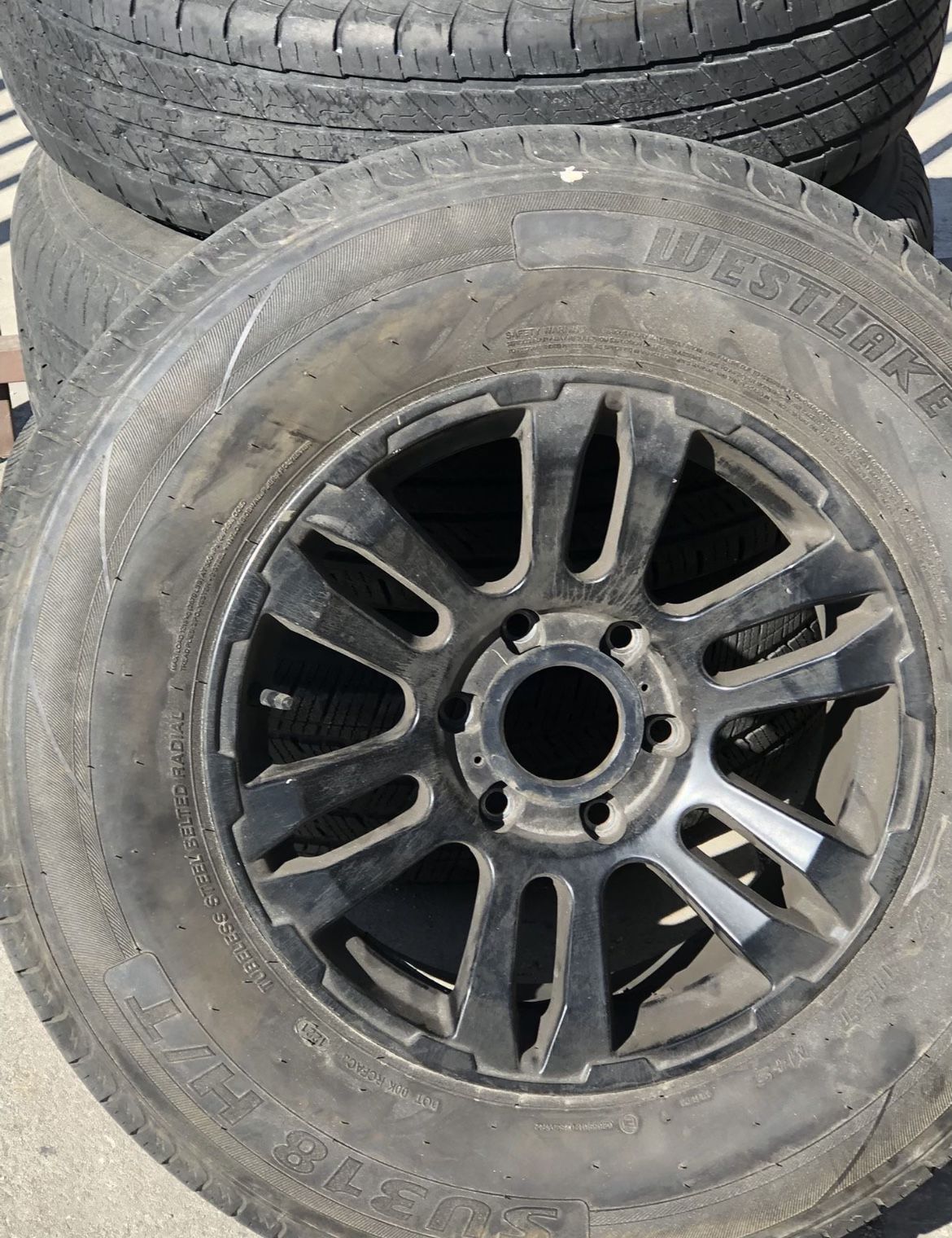 Chev rims 6 lug Black color $300  tires ok condition 