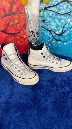 Converse Chuck Taylor High Top Leather Sneakers, men’s size 6 and women’s size 8. Pre-owned.