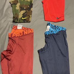 4 Nike Compression Pants - Size Medium
