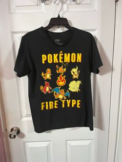 Adult  Size Medium Black Pokémon Theme T-shirt.  Preowned Very Good Condition .  Purchased at Hot Topic.  Smoke free home