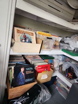 Records $2 movie cassette $1 divd movies $1