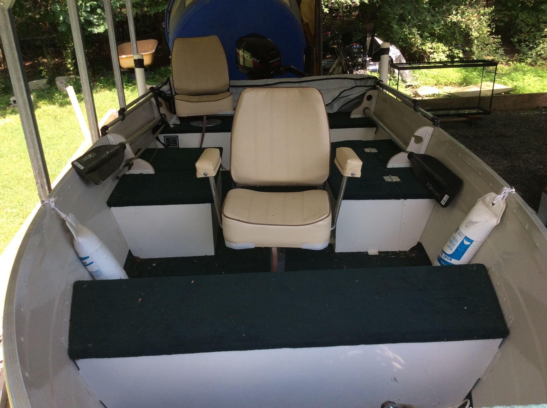 16 foot smoker craft with 9 .9 Mercury engine new trailer live bait