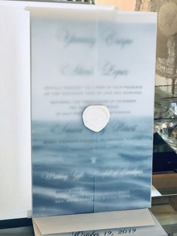 $6 ea . Vellum cover & wax seal invitations