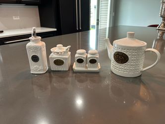 Porcelain salt and pepper shaker, vinegar and sugar and tea set