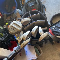 2 Sets Of Golf Clubs
