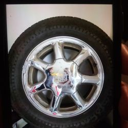 Cadillac. Snow tires. On Cadillac Rims 16inch
