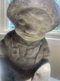 Vintage little fisherman cement figurine