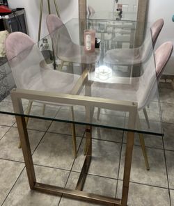 Glass table with chairs