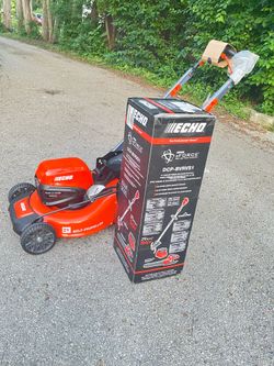 Echo  new battery powered outdoor kit lawnmower trimmer, blower, battery and charger