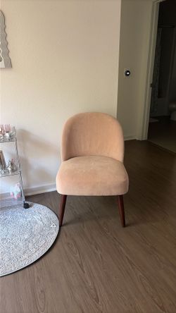 Pink upholstered chair