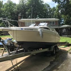 1996 Wellcraft Excel with 2005 Performance Trailer.