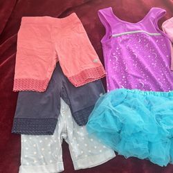Gymnastics Bundle With 2 Rashguards And A Tutu Skirt For Girls Ages 6-7. Take All For Price Listed. No Lower. Firm On Price 
