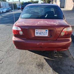 Kia 1998  4 Door Sudan (Red)