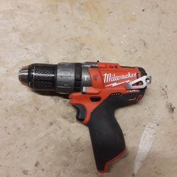 Hammer drill with battery and charger