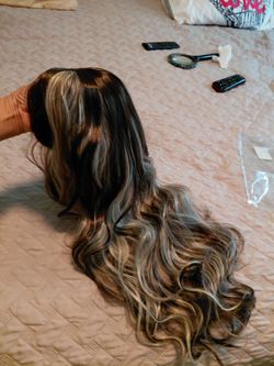 New long wig with high lights.
