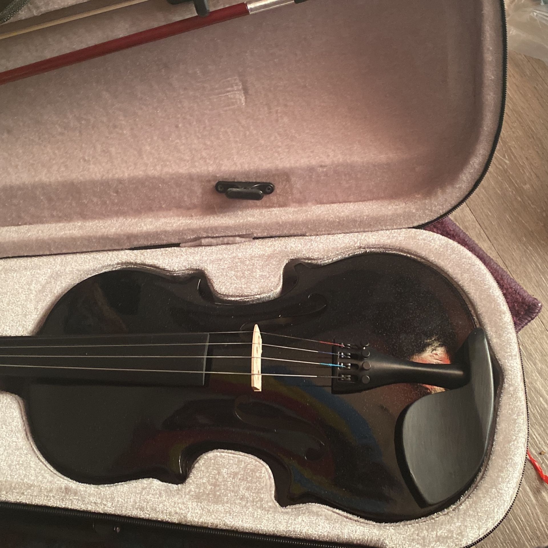 black 4/4 size solid wood violin with bow, rosin, shoulder rest, and case