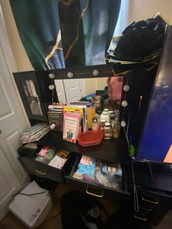 Black vanity with lights
