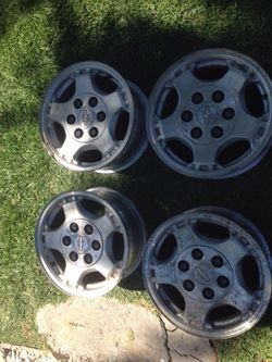 Chevrolet Silverado 16'' stock rims.