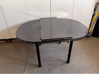 Modern wooden extendable dining table