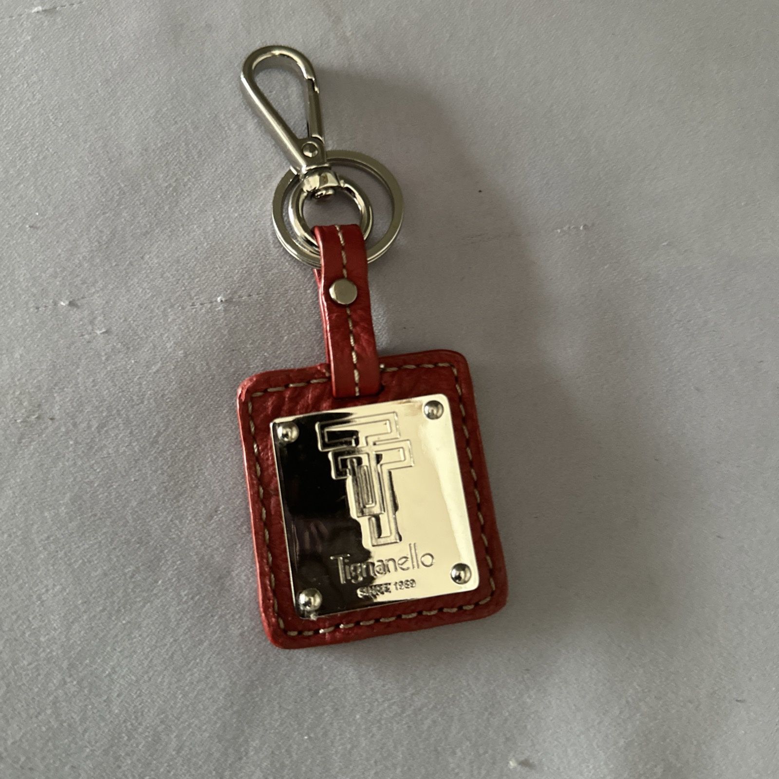 Tignanello Purse Key Fob Keychain Hang Tag Leather and Chrome Metal Red.
