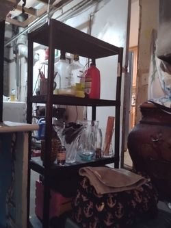 Four and a half to 5 ft tall shelf for tier made out of hard sturdy plastic