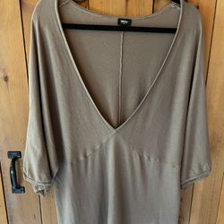 Womens plus size 18/20W 3/4 sleeve and low v-neck light weight sweater. Tan color