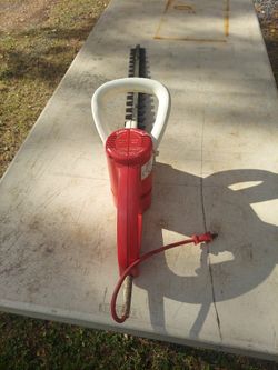 Electric hedge trimmer. 24 inches. Little wonder.