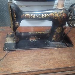 Singer Sewing Machine $800