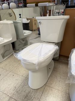 KOHLER Highline Arc 2-Piece 1.28 GPF Single Flush Elongated Toilet in White (Seat Included) many in stock $150 no delivery