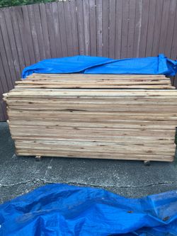 A pallet of  cedar Pickets 6 x 3 1/2