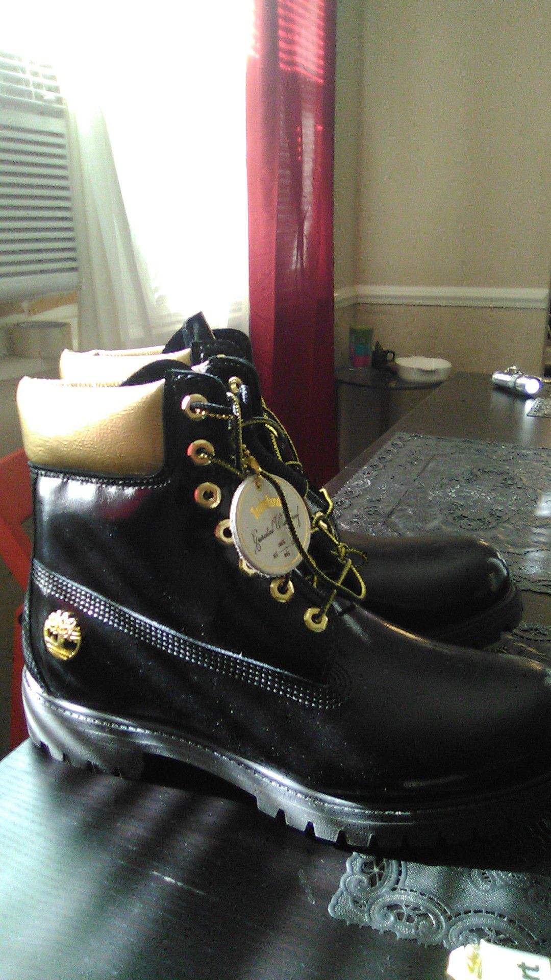10 half 11's for100 bucks ,water proof black and gold Timberland boats