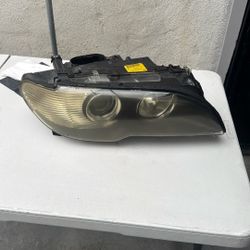 Pre-Owned BMW 2004 325CI Headlights 