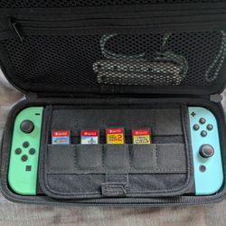 Nintendo Switch Animal Crossing console with 7 games