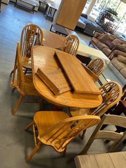 Dining table and chairs set (in store)