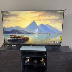 Sony 65" Class - X80CK Series - 4K UHD LED LCD TV along with TV Stand and 2 year company warranty