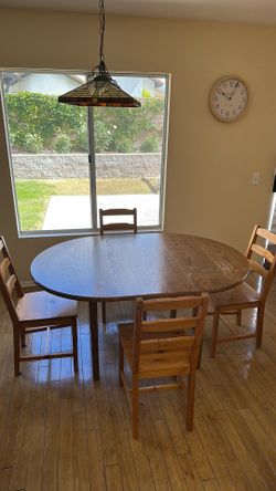Solid wood extendable dinning set table with 4 chairs $80