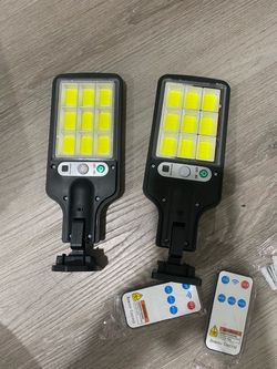 2-Pack Solar Outdoor Motion Sensor Lights with Remote – $8 for Both