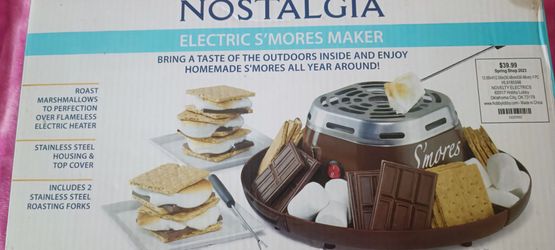 New. Open box Nostalgia Electric S'mores Maker