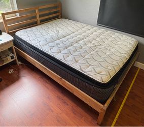 Full size mattress and wood frame