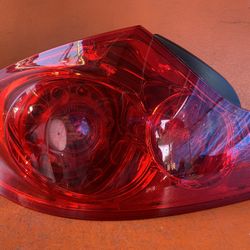 2007 - 2012 Infiniti G25 G35 G37 Left Driver Side Tail Light OEM 26555JK60D