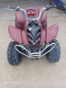 Red ATV Four Wheeler with Front Bumper