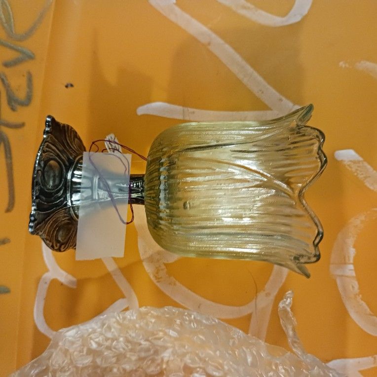 It's Green Glass Smaller Candle Holder But It's A Flower On A Metal Base