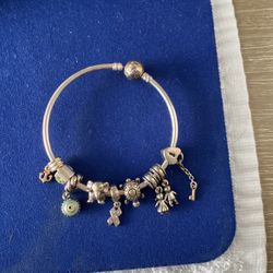 Pandora Bracelet With 9 Charms , All Sterling Silver With Two  Having  14 Gold  