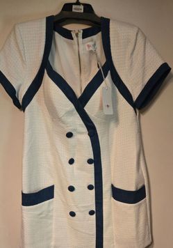 White dress with blue trim double breast with  two front pockets