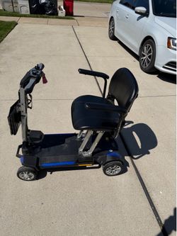 Golden Buzzaround Carry On Power Scooter